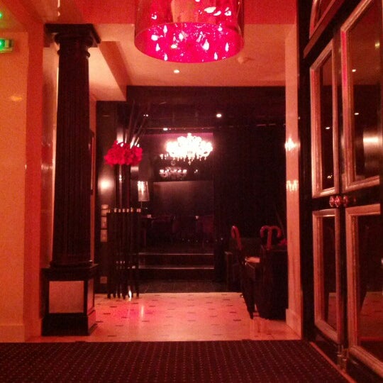 Photo taken at MonHotel Lounge &amp; Spa by Adam C. on 12/2/2012