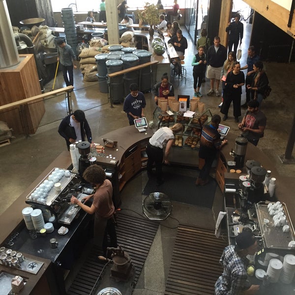 Photo taken at Sightglass Coffee by megan on 10/23/2015