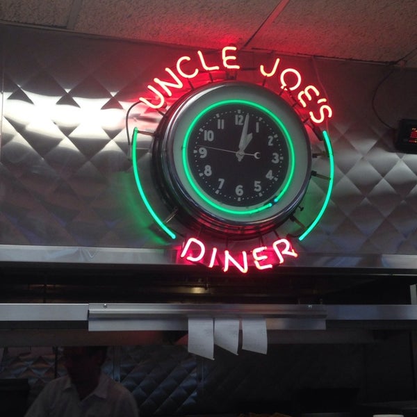 Photo taken at Uncle Joe&#39;s Diner by Justin B. on 3/22/2014
