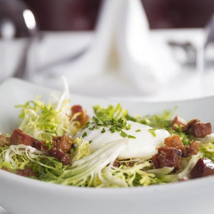 Bistro Bordeaux is the cozy date place you've always sought but didn't know existed. And the salade Lyonnaise is the ideal starter for the rich entrees to follow.