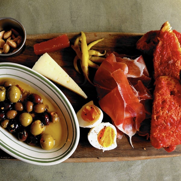 The Spanish board was a knockout breakfast dish with serrano ham, peppers, olives and manchego cheese accompanied by toasted bread slices.