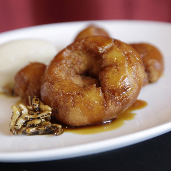 Eat this: Old-fashioned doughnuts. The dessert doughnut dish at Inovasi combines freshly fried mini-doughnuts with a pale ale caramel sauce, puffed wild rice, and housemade apple cider sorbet.