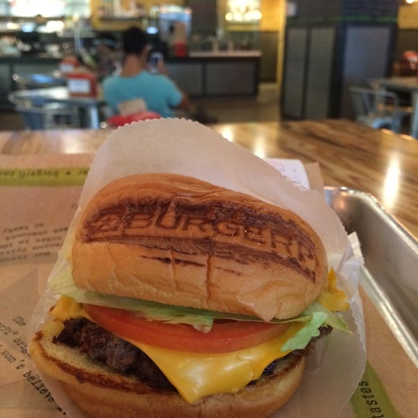 Photo taken at BurgerFi by Luke C. on 8/2/2014