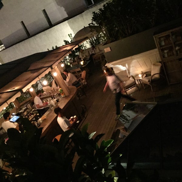 Photo taken at Soho House Roof Top by Alexandra L. on 6/29/2015