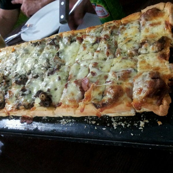 Photo taken at La Pizza Mia by Letícia D. on 2/2/2014