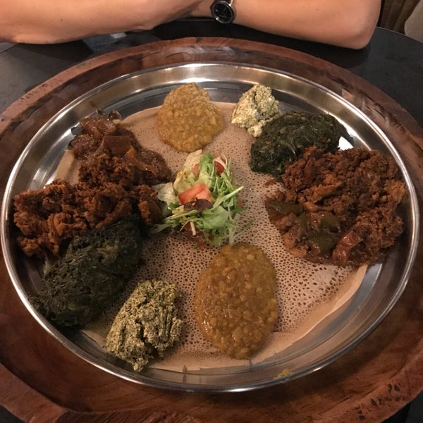 Decent atmosphere, good clientele and spicy yet very delicious Ethiopian food. The only problem is the open kitchen. My hair, shirt, everything smelled garlic and onion after the dinner.