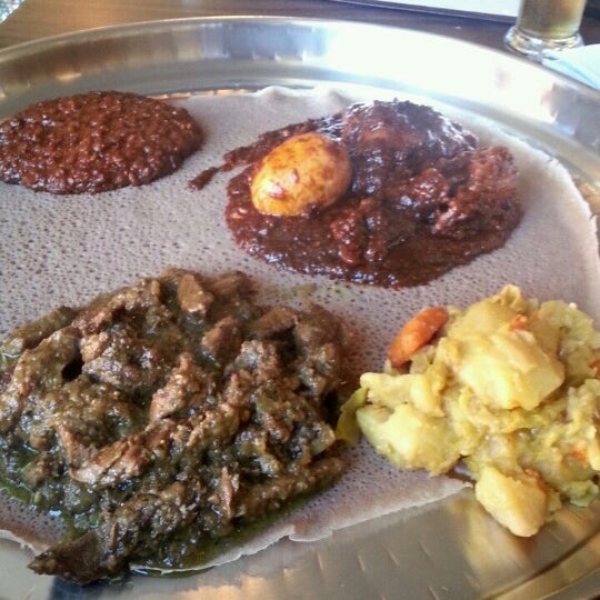 Photo taken at Ras Dashen Ethiopian Restaurant by Chrystal D. on 11/22/2013