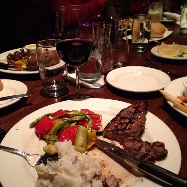 Photo taken at The Keg Steakhouse + Bar - Arlington by Ryan S. on 12/2/2013