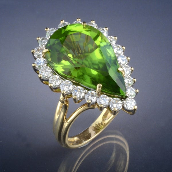 Make your Holidays Merry and Bright! Green Peridot & Diamonds set in 18 karat gold! Phone Bonnie at 503-227-1153 for details