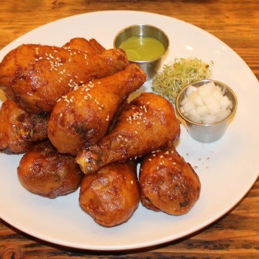 Try the Korean Fried Chicken. Comes in either Soy Garlic, Hot & Spicy, or Salt & Pepper. ;)