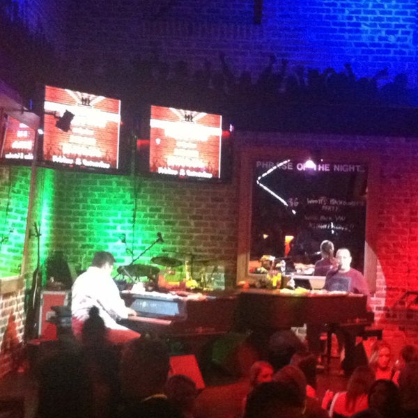 Photo taken at Bobby McKey&#39;s Dueling Piano Bar by Jenn B. on 4/28/2013