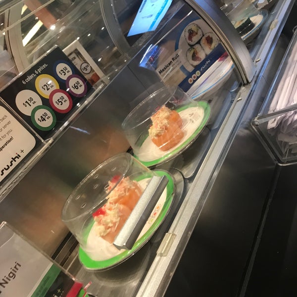 Photo taken at Sushi + Rotary Sushi Bar by Vija on 7/6/2018