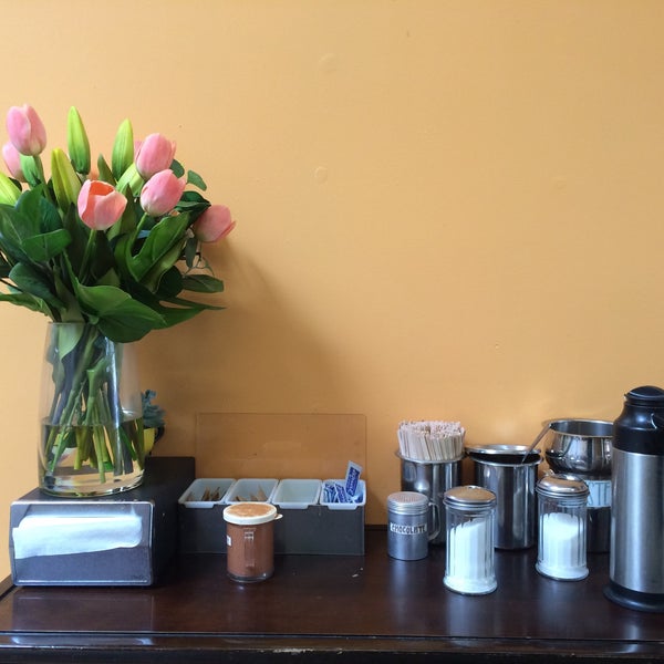 Photo taken at Un Cafecito by Erin C. on 5/22/2015