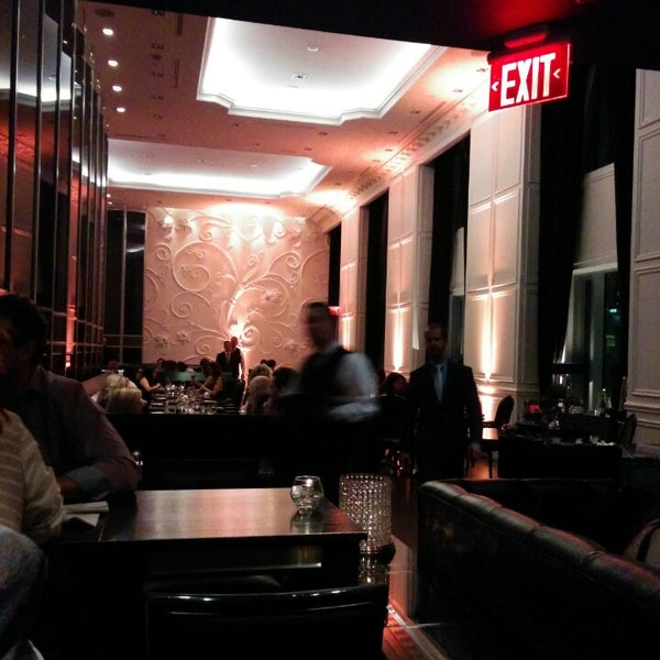Photo taken at STOCK Restaurant Bar &amp; Lounge by April D. on 5/24/2014