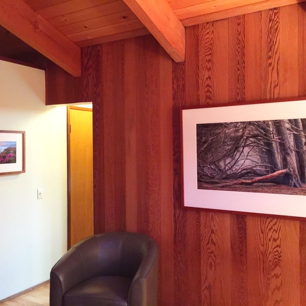 New hardwood floors grace all three bedrooms and the en suite bathroom. Our principal bedroom also has new photographic art by Paul Kozal