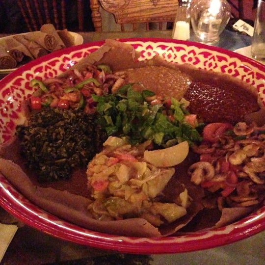 Photo taken at Queen of Sheba Ethiopian Restaurant by Giacomo M. on 11/10/2012