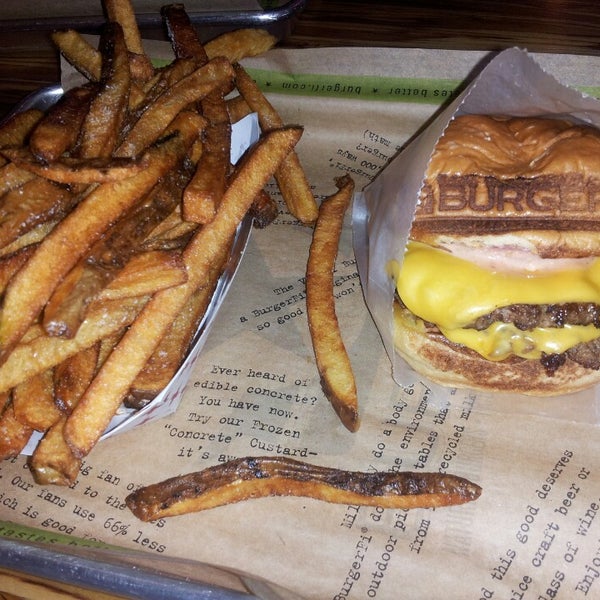 Photo taken at BurgerFi by Carrie S. on 12/5/2013