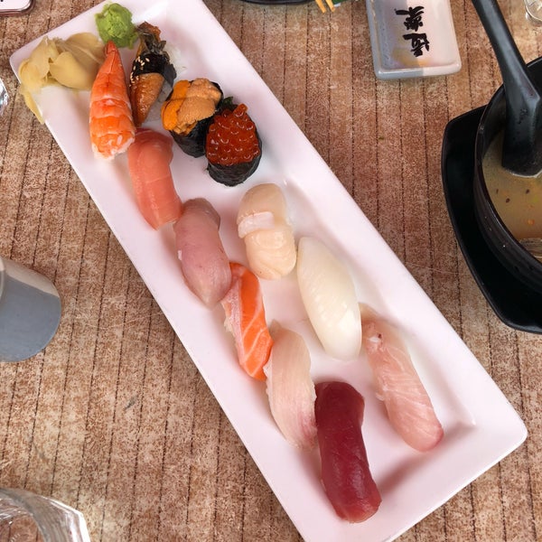 Photo taken at Doraku Sushi by Xinruo J. on 6/29/2018