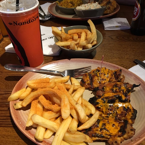Photo taken at Nando&#39;s by Kelly G. on 6/12/2017