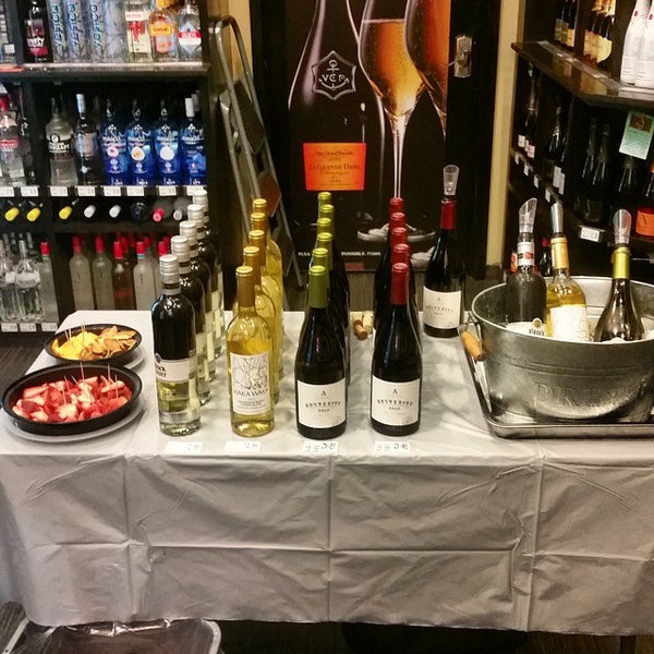 Photo taken at West End Wine &amp; Spirits by ANDREW L. on 4/3/2015