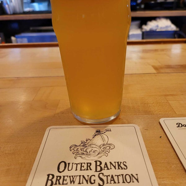 Photo taken at Outer Banks Brewing Station by Michael K. on 9/11/2022