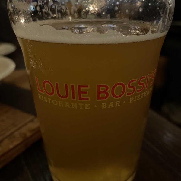 Photo taken at Louie Bossi&#39;s Ristorante Bar Pizzeria by R&amp;J&#39;s P. on 1/16/2023