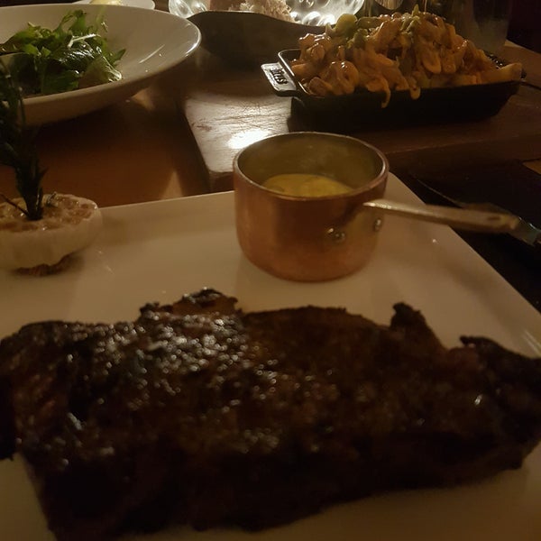 Photo taken at Seafire Steakhouse by Elie M. on 8/3/2017