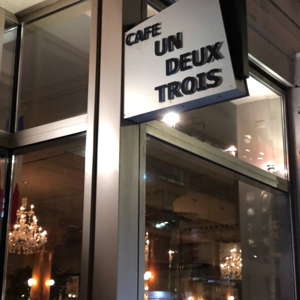 Photo taken at Cafe Un Deux Trois by Jim J. on 7/25/2018