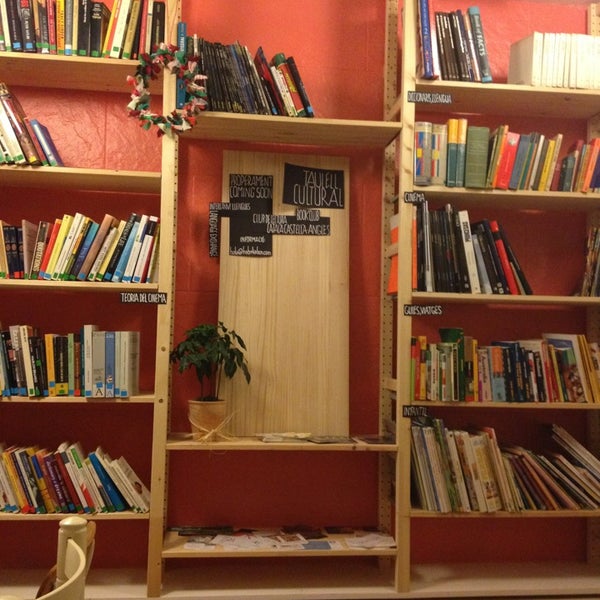 Photo taken at Babèlia Books &amp; Coffee by Alejandra T. on 1/2/2013
