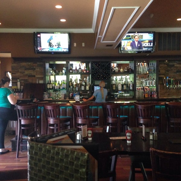 Photo taken at The Brown Stone Bar &amp; Grill by Rachel C. on 7/16/2014