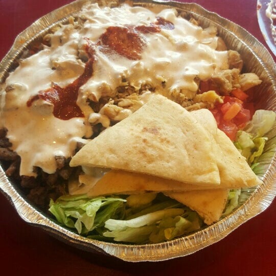 Photo taken at The Halal Guys by Darryl T. on 12/18/2015