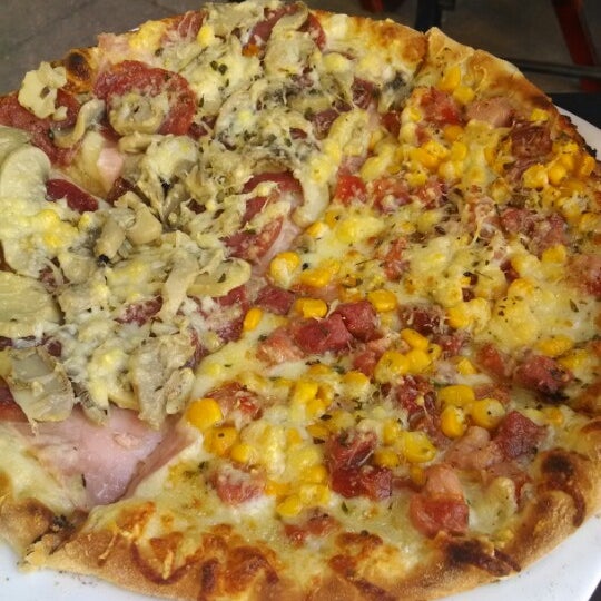 Foto tomada en Rei do Pedaço Pizzas  por Brenno V. el 1/26/2014