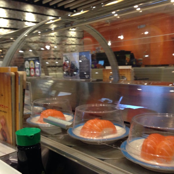 Photo taken at Sushi + Rotary Sushi Bar by Airanthi W. on 12/27/2015