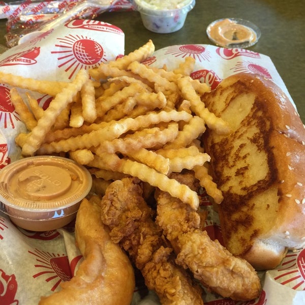 Photo taken at Raising Cane&#39;s Chicken Fingers by First L. on 11/22/2014