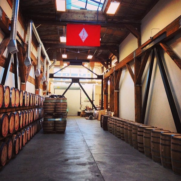 Photo taken at Westland Distillery by Eric T. on 2/15/2014
