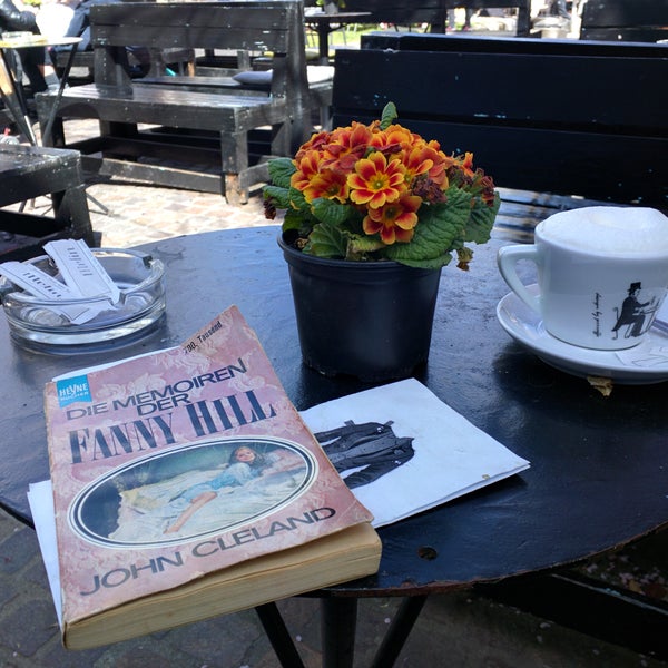 I had a cappuccino and cafe latte.. The outside sitting area is beautiful, under rosy trees and great music.. And my bill was delivered in a fanny hill book 😂