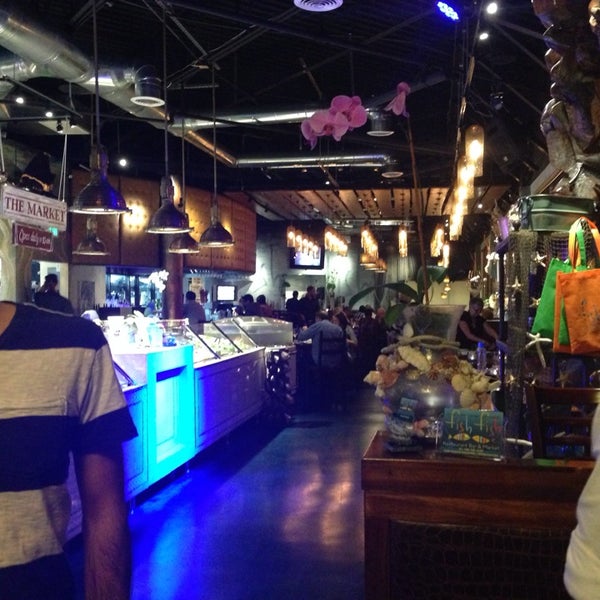 Photo taken at Fish Fish Restaurant, Bar, &amp; Market by Ariel M. on 10/12/2013