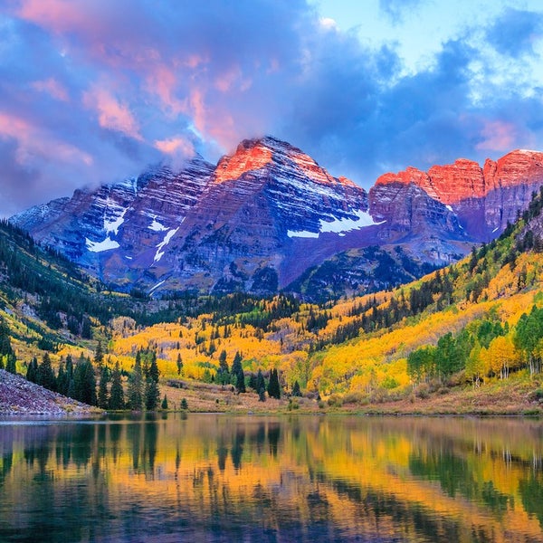 Maroon Bells is home to hikes for every kind of nature enthusiast. Don't forget to look down: Maroon Lake reflects the Bells, wildflowers, and aspens galore.