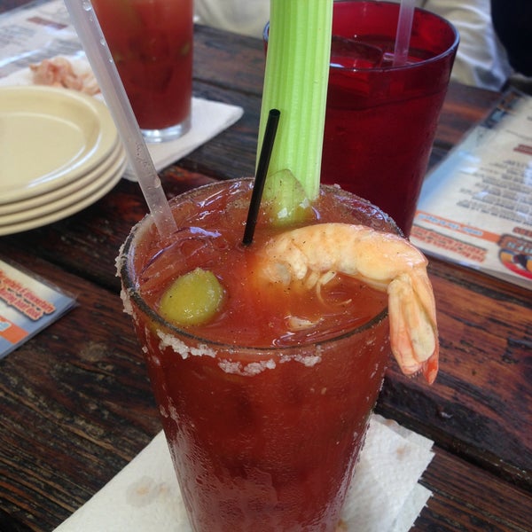 Photo taken at Outriggers Seafood Bar &amp; Grill by REALTOR® Jennifer P. on 4/14/2013