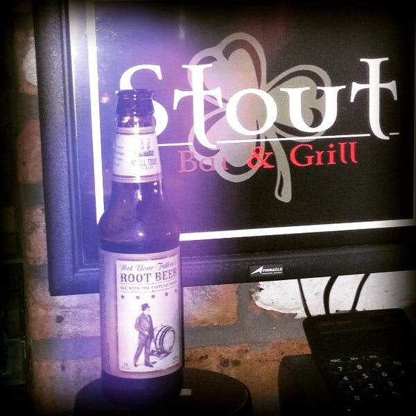Photo taken at Stout Bar &amp; Grill by Stout B. on 5/23/2015