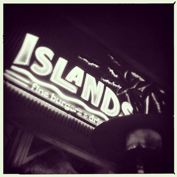 Photo taken at Islands Restaurant by Evan G. on 2/12/2012