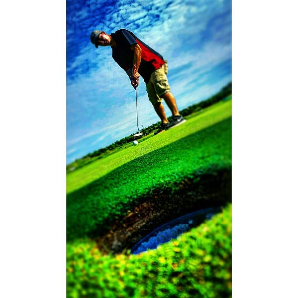 Photo taken at McCullough&#39;s Emerald Links by Adam M. on 8/7/2015