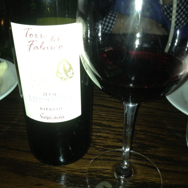 Photo taken at Finalmente Italian Wine Bar &amp; Restaurant by Karen B. on 2/17/2013