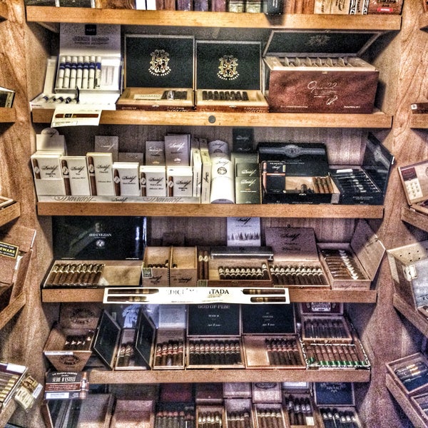 Photo taken at Bayside Cigars by Emre P. on 2/26/2015
