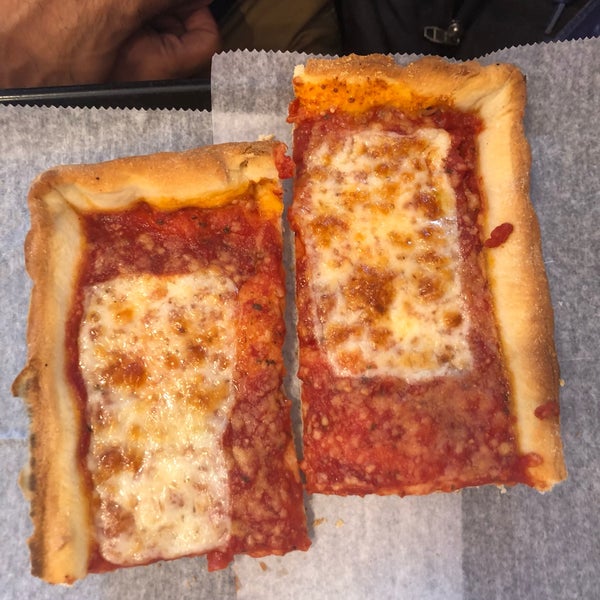 Photo taken at Rizzo&#39;s Fine Pizza by Erika S. on 7/29/2018