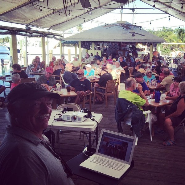 Photo taken at Dockside Tropical Cafe by Fran H. on 3/11/2015