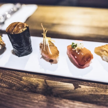 The slim restaurant’s sardine-can-size kitchen sends out wild riffs on sushi, like pork-belly or chopped-beef-with-uni & more gluttonous dishes like a grilled cheese sandwich oozing melted foie gras.
