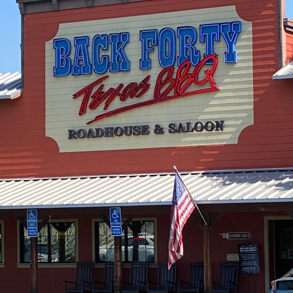 Photo taken at Back Forty Texas BBQ Roadhouse &amp; Saloon by Andrew D. on 10/2/2021