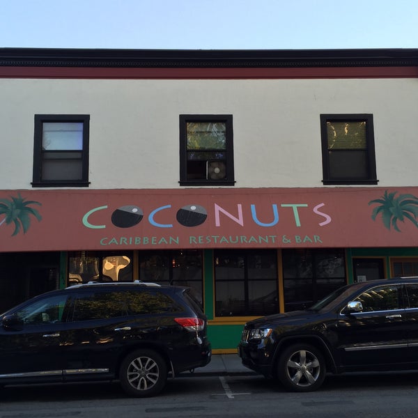 Photo taken at Coconuts Caribbean Restaurant &amp; Bar by Andrew D. on 2/3/2019