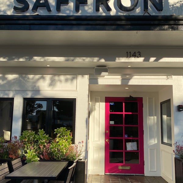 Photo taken at Saffron Indian Bistro by Andrew D. on 7/23/2021